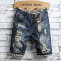 Pantalones cortos vaqueros rotos para hombre 2025, nueva moda de verano, estilo casual, corte ajustado (Slim Fit), diseño retro desgastado, shorts de mezclilla de marca para hombre.
