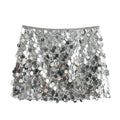 Falda mini de lentejuelas plateadas para mujer. Diseño de cintura alta con acabado brillante y estilo elegante. Moderna y llamativa, ideal para fiestas y looks Y2K.