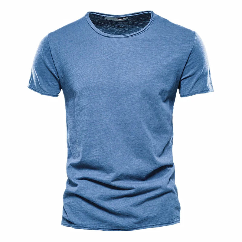 Camiseta de hombre 100% algodón. Diseño casual, suave y ligero, ideal para verano y fitness. Cuello redondo y manga corta, perfecta para uso diario o ropa de casa.