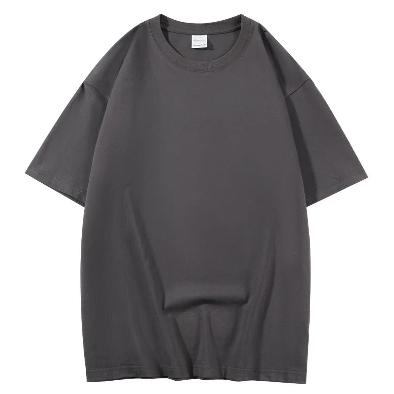 Camiseta unisex 100% algodón con media manga, estilo holgado para verano. Camiseta básica casual de manga corta, cuello redondo y color sólido.