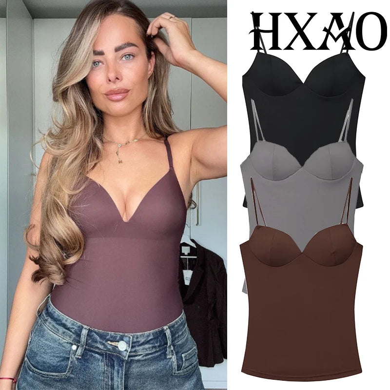 Top tipo corsé corto para mujer. Sin mangas, con tirantes y diseño ajustado tipo bodycon. Disponible en negro y marrón, con estilo bustier y espalda descubierta. Sexy, moderno y ideal para looks de verano o streetwear.