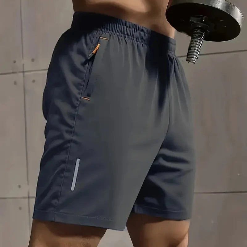 Nuevos shorts deportivos de verano para hombre. Diseño cómodo con cintura elástica, tejido transpirable y ligero, ideal para entrenar, hacer deporte o usar a diario. Disponibles en tallas grandes (Plus Size) para un ajuste cómodo y moderno.