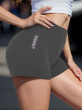 Shorts deportivos para mujer tipo ciclista. Ajustados, transpirables y de cintura alta. Ideales para fitness, yoga y entrenamiento, ofreciendo comodidad y libertad de movimiento.