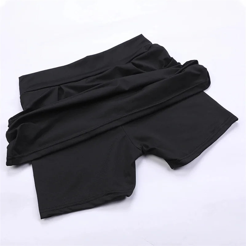 Minifalda de cintura alta con shorts integrados y tejido de secado rápido. Ideal para tenis, fitness, baile y actividades deportivas, combinando comodidad, estilo y libertad de movimiento.