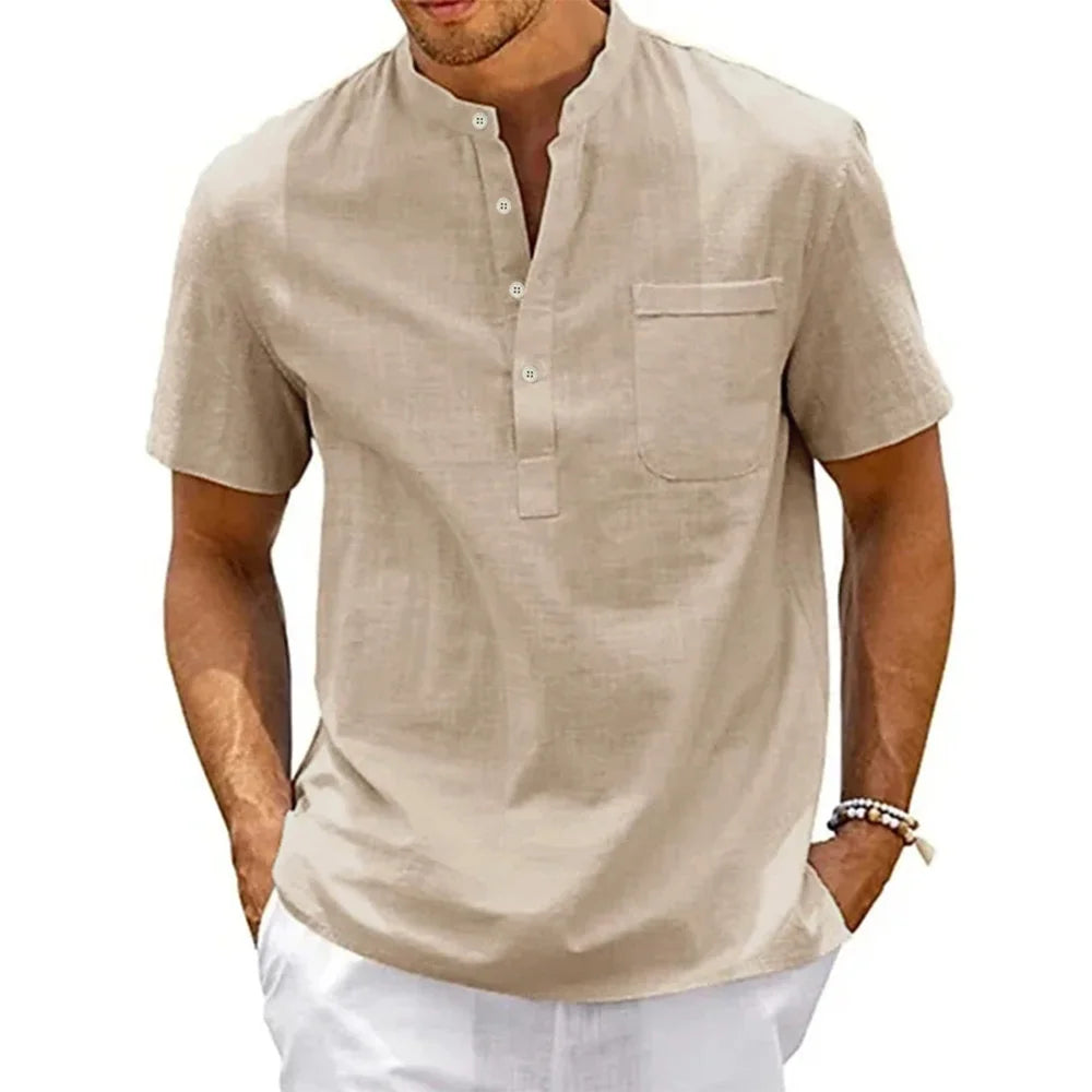 Camisa de lino y algodón para hombre con cuello Henley y bolsillo. Diseño casual de manga corta y color sólido, ideal para la playa, el uso diario o un estilo vintage y urbano. Ligera, fresca y cómoda para cualquier ocasión.